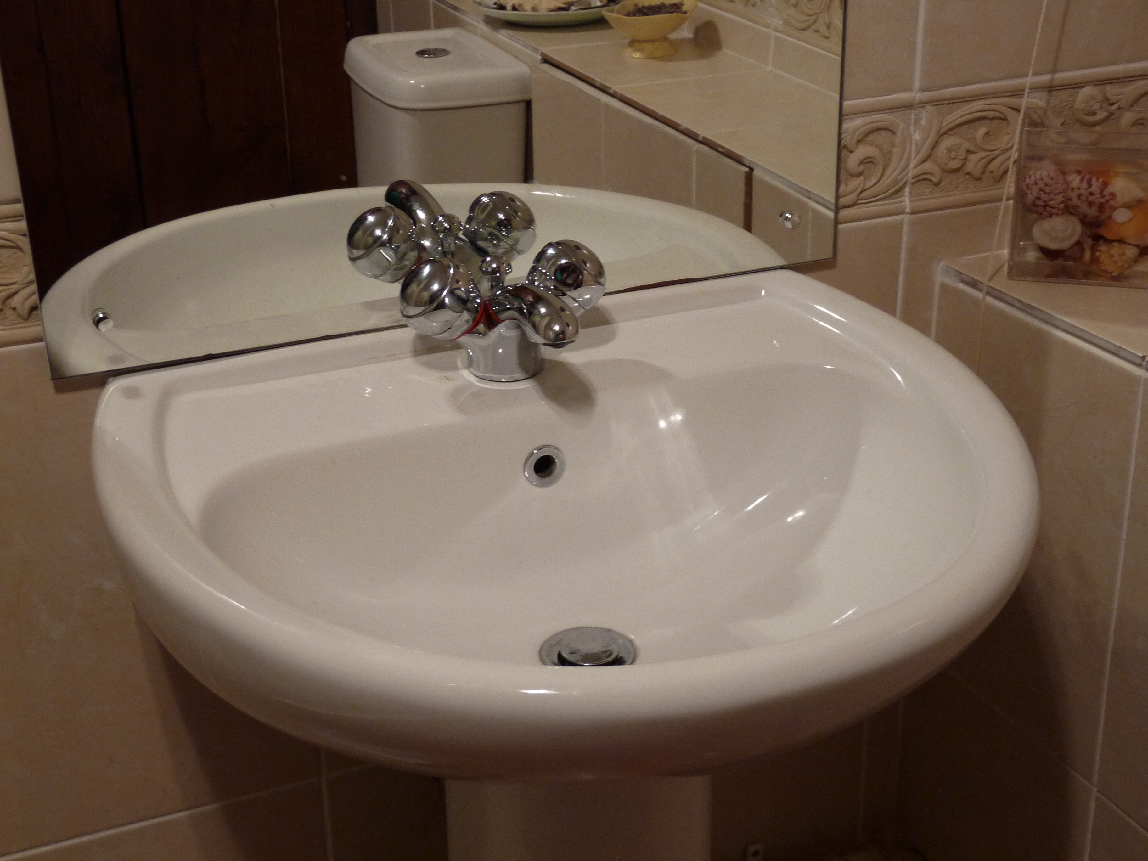 Bathroom sink and faucet fixture installation
