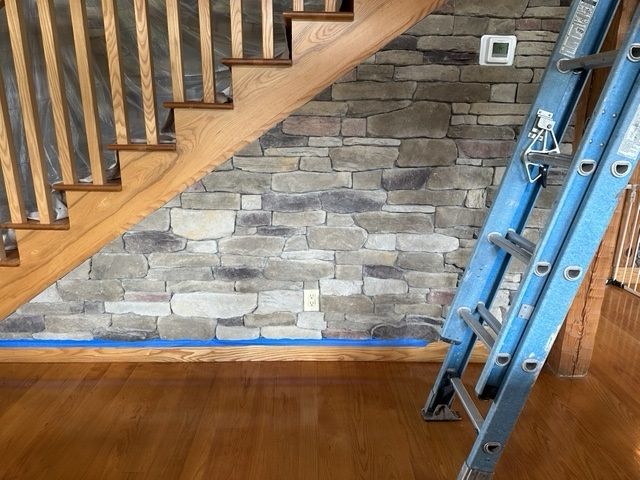 Staircase with stone accent