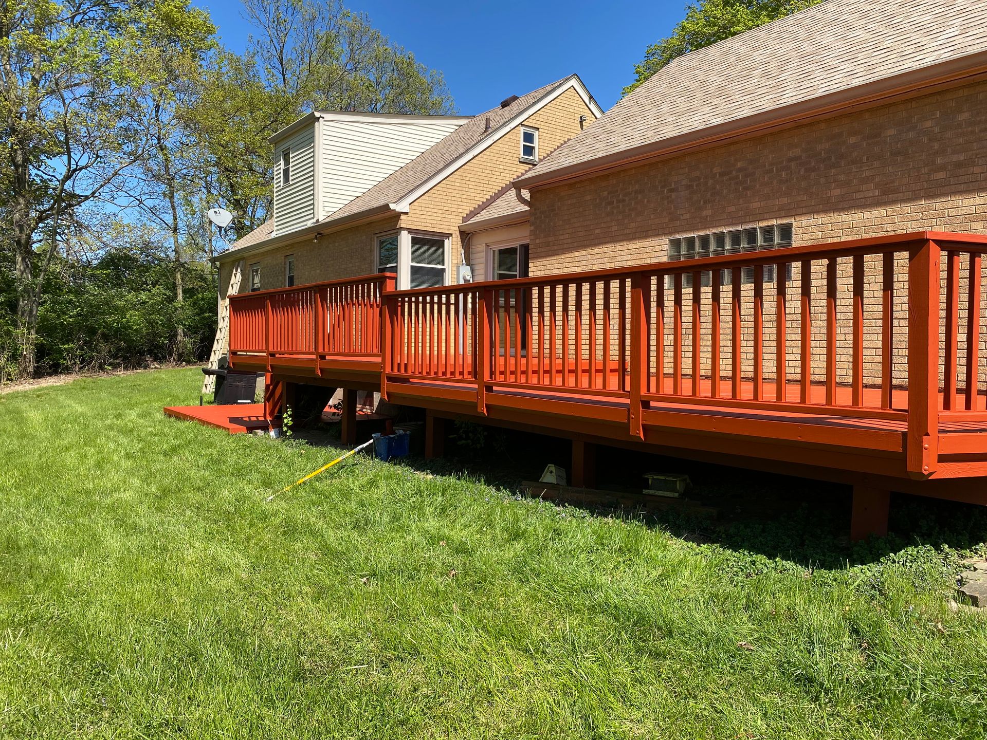 Stained deck with railing